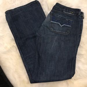 Like new !! Boot cut low rise diesel jeans!